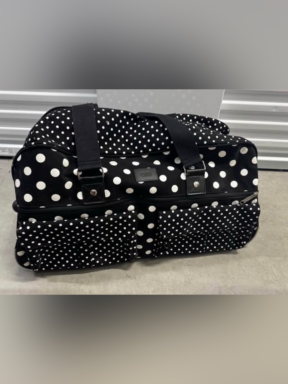 The Victoria's Secret PINK Wheelie Expandable Polka Dot Luggage